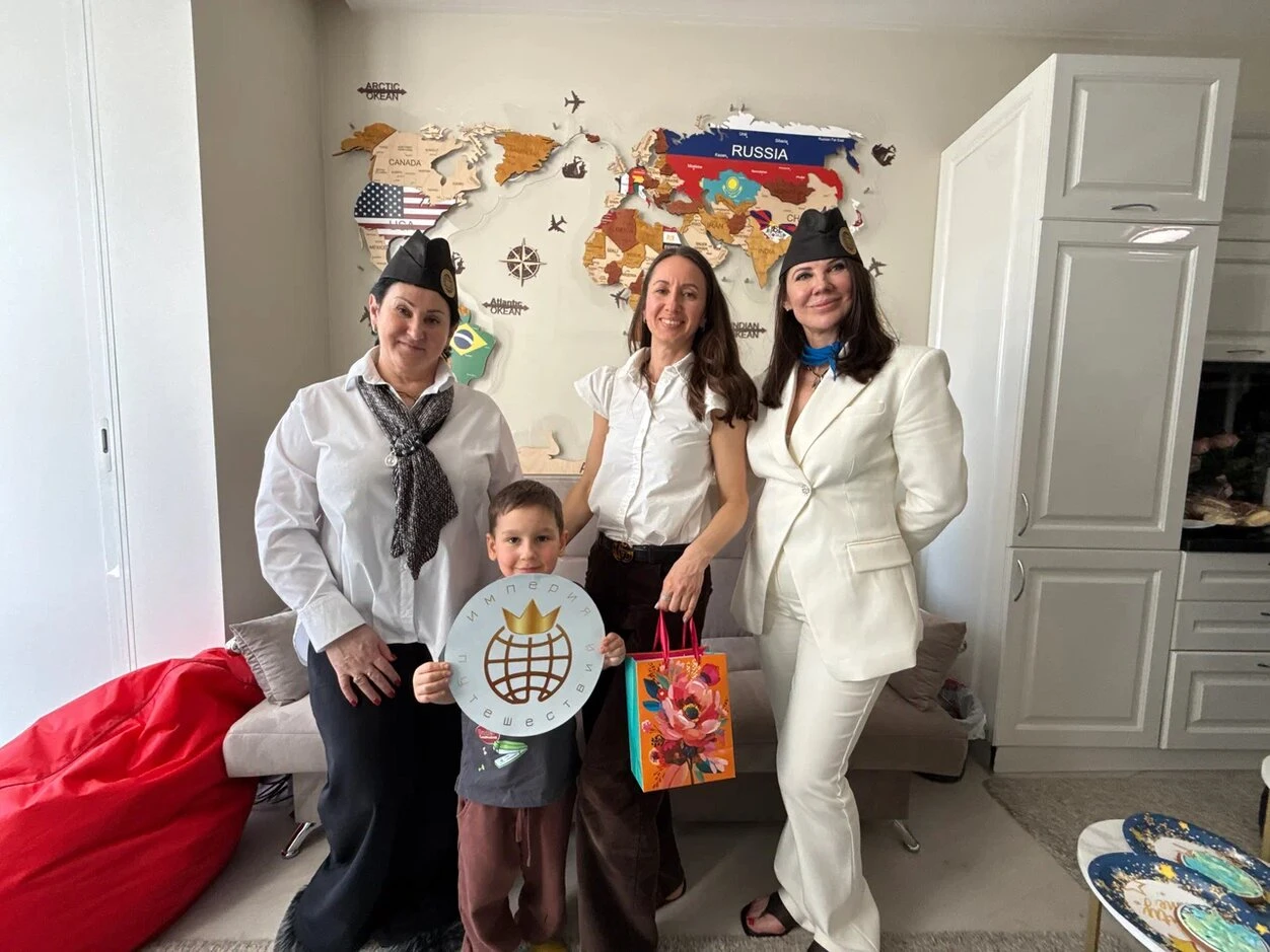 Young Men Looking at the Laptop Screen and Smiling