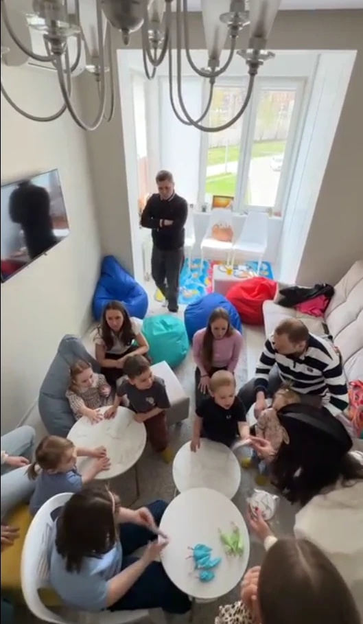 A Man Talking using Microphone in the Conference Room