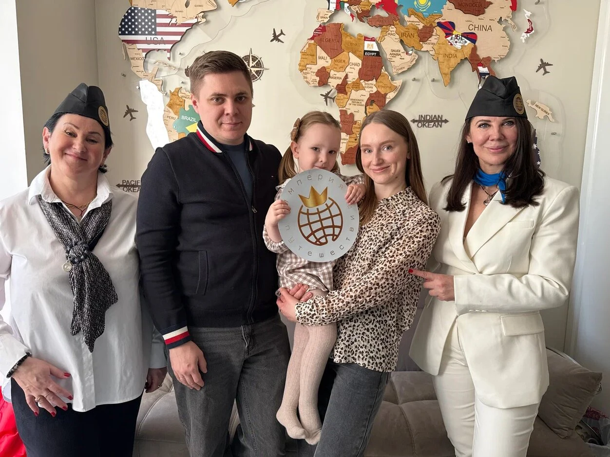 Group Taking a Selfie at a Concert Venue